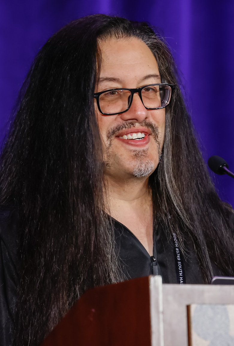 John Romero speaking at the Game Developers Conference in 2022